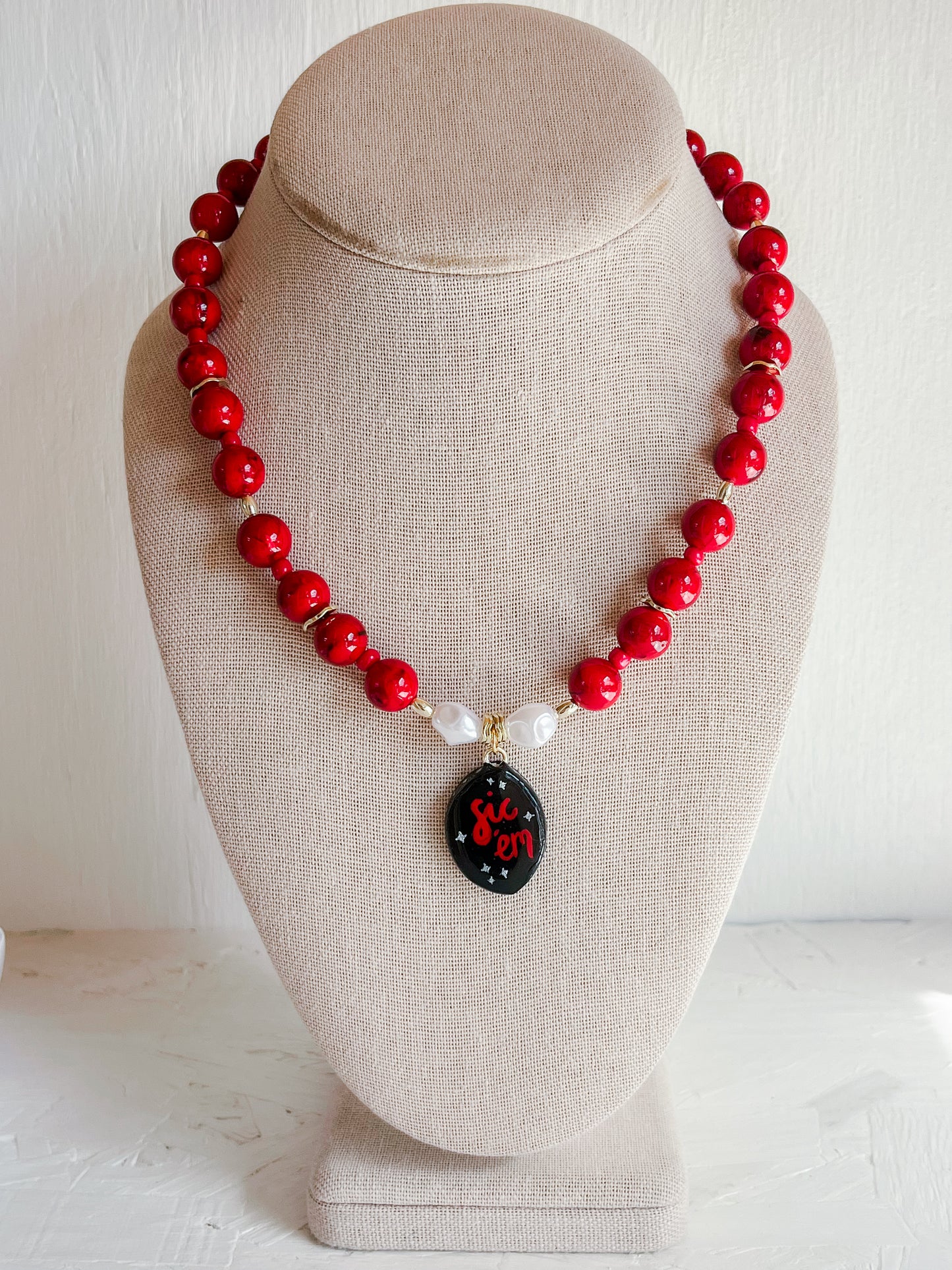 Red “Sic ‘em” necklace