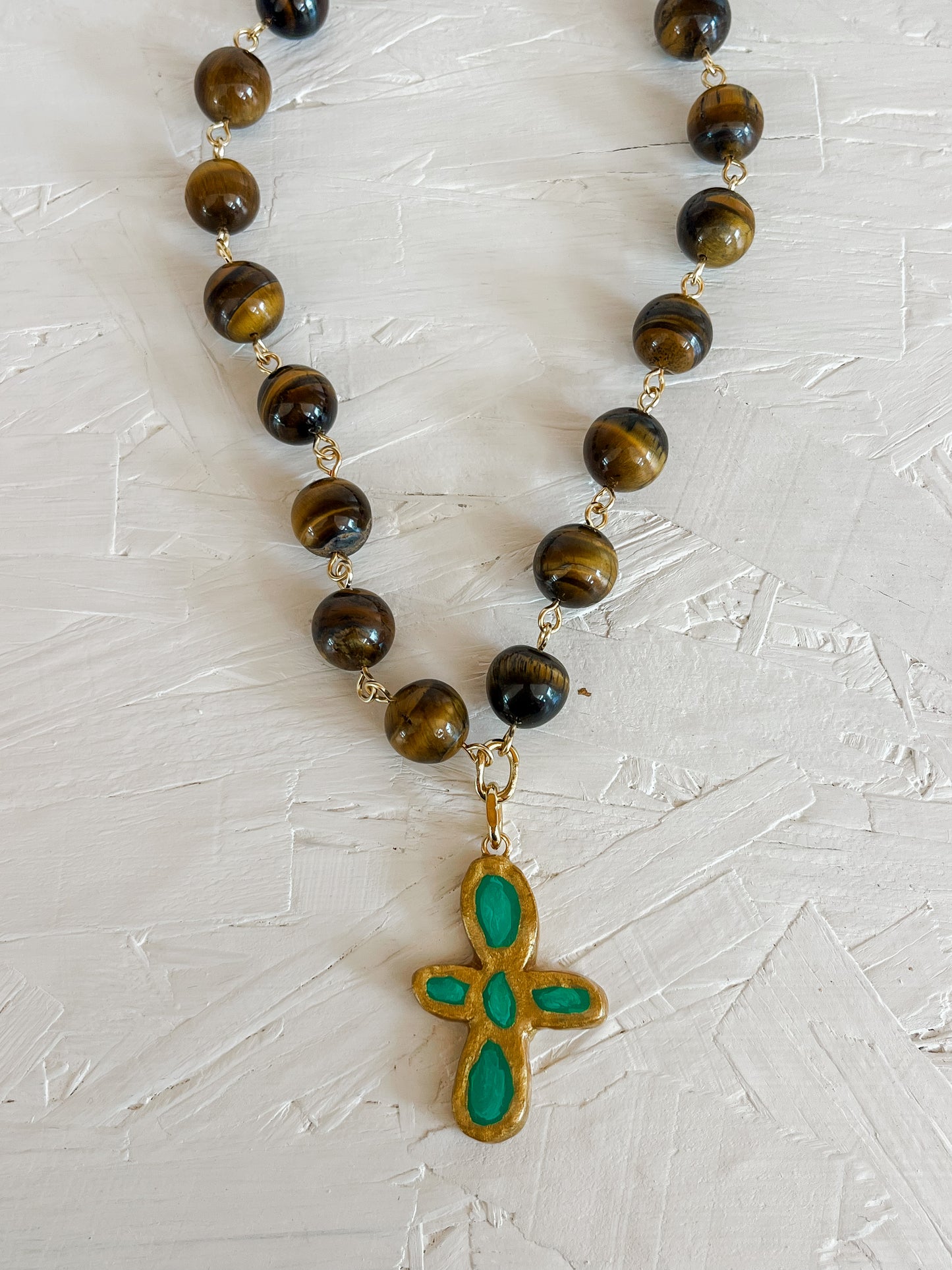 Green cross necklace