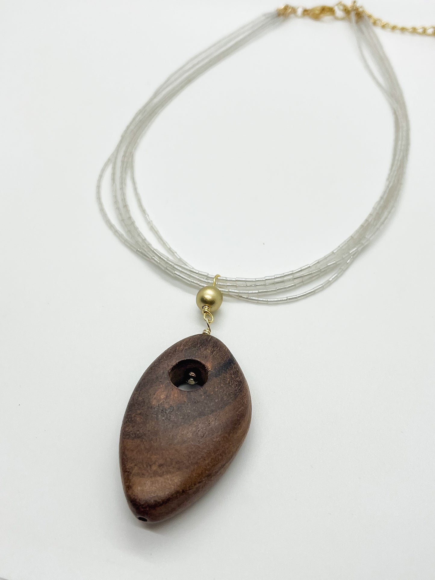 Multi strand wood pendant necklace