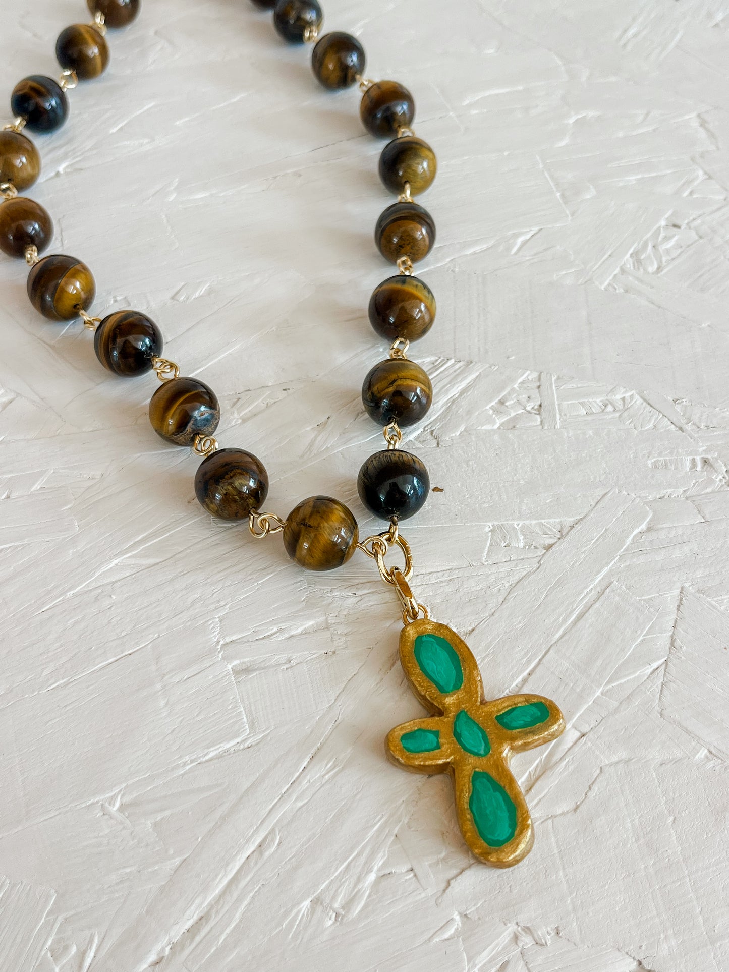 Green cross necklace