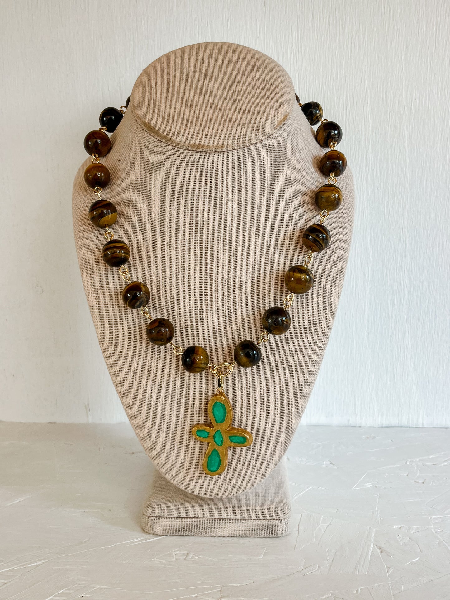 Green cross necklace
