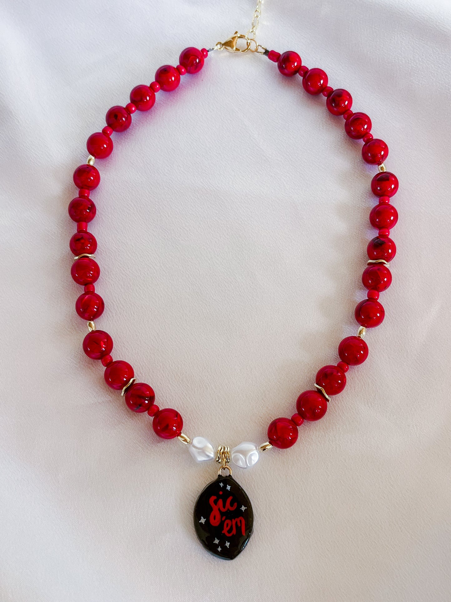 Red “Sic ‘em” necklace