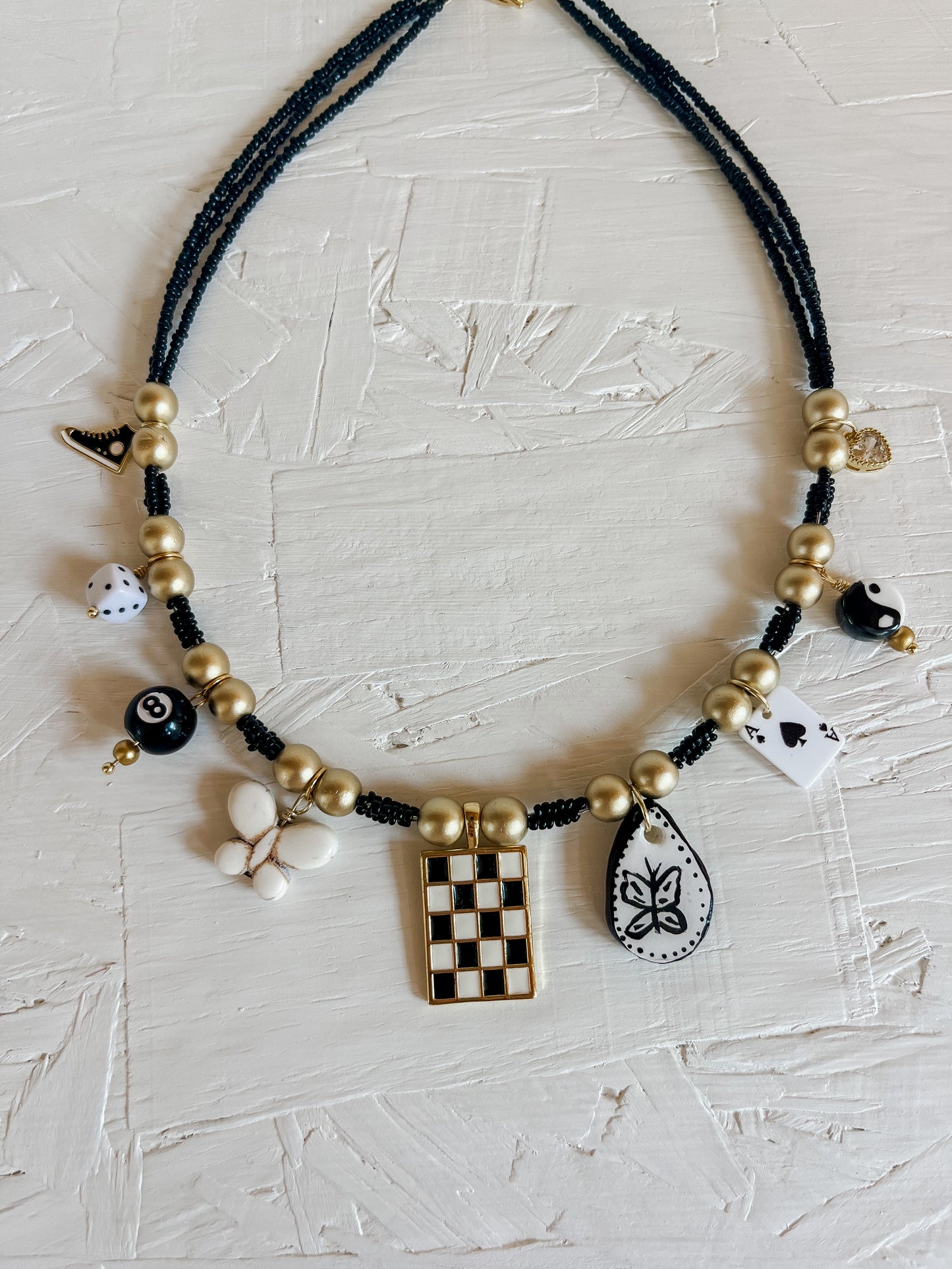 Black charm necklace
