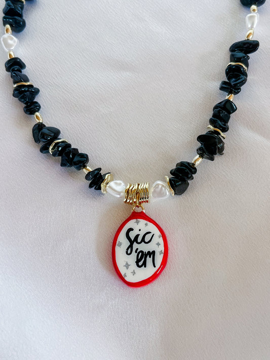 Black “Sic ‘em” necklace