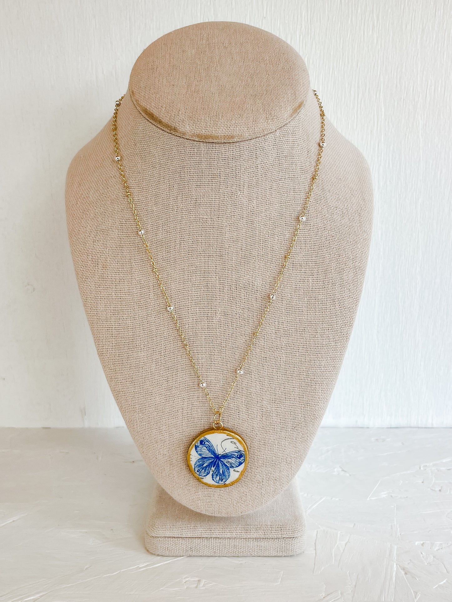 Blue butterfly necklace