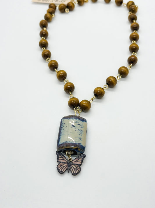 Blue/tan ceramic & butterfly necklace