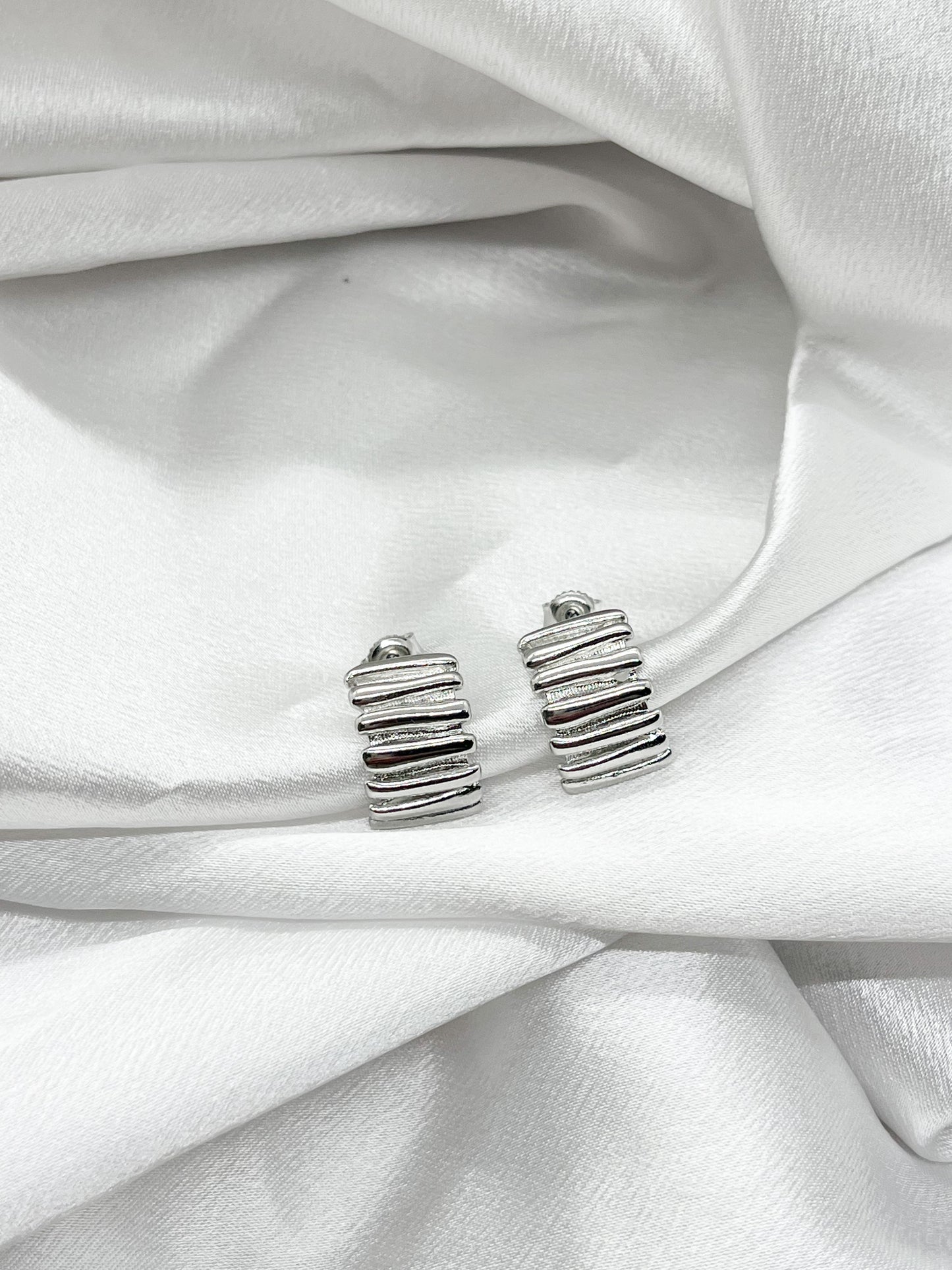 Silver ribbed studs