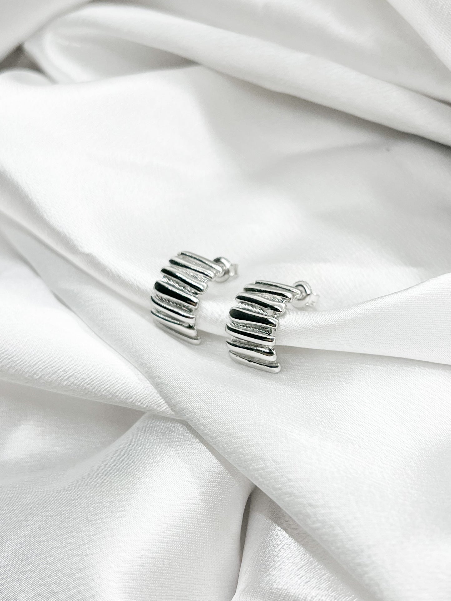 Silver ribbed studs