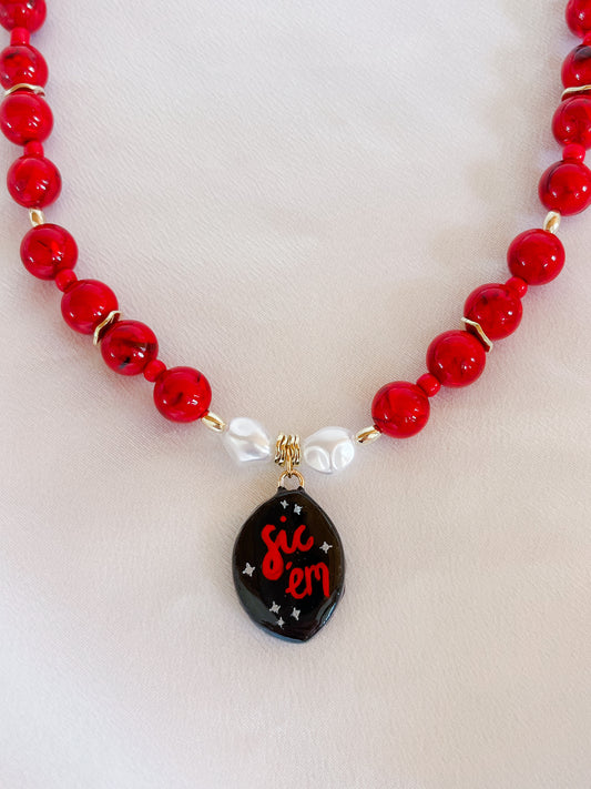 Red “Sic ‘em” necklace