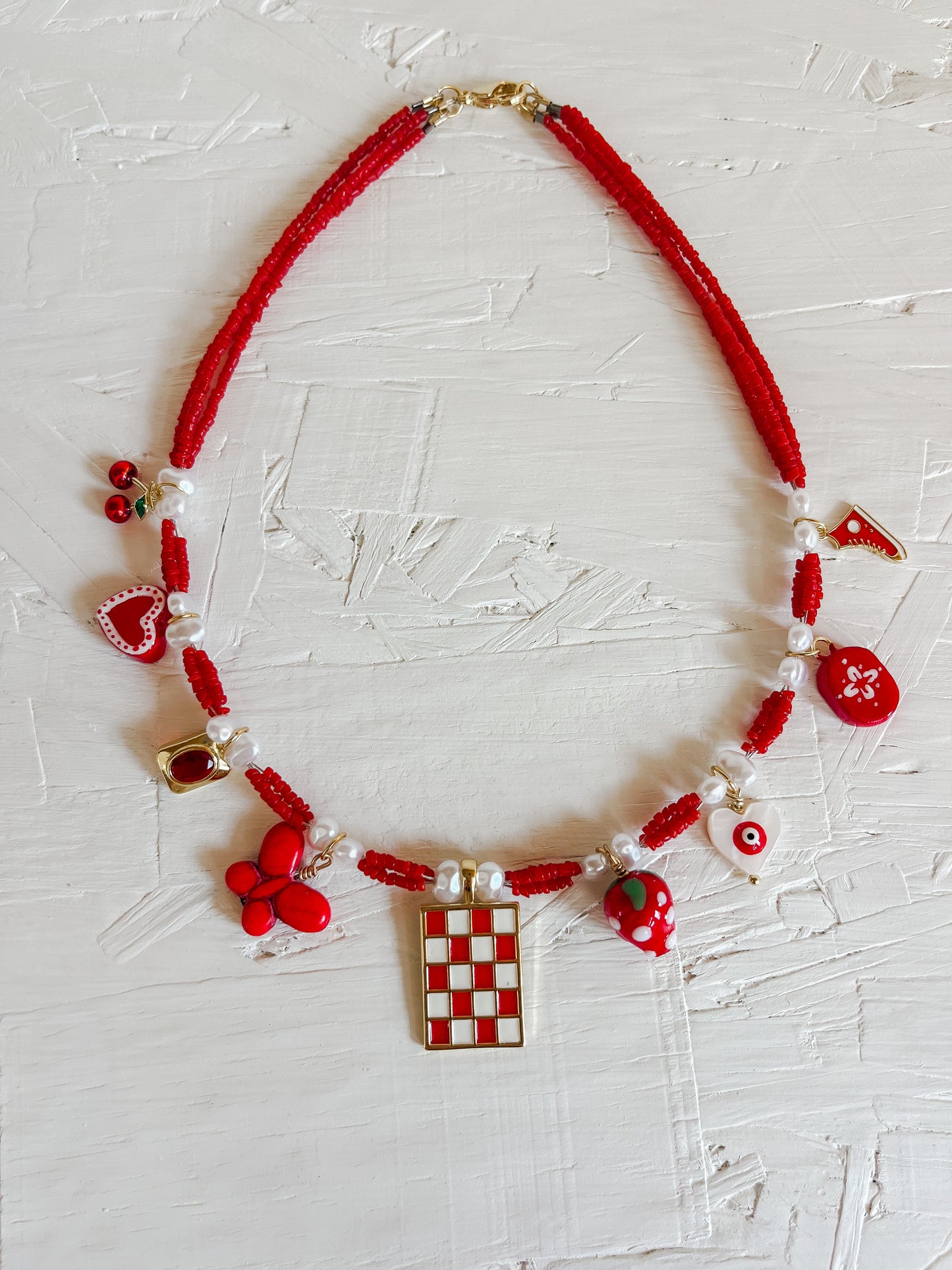 Red charm necklace