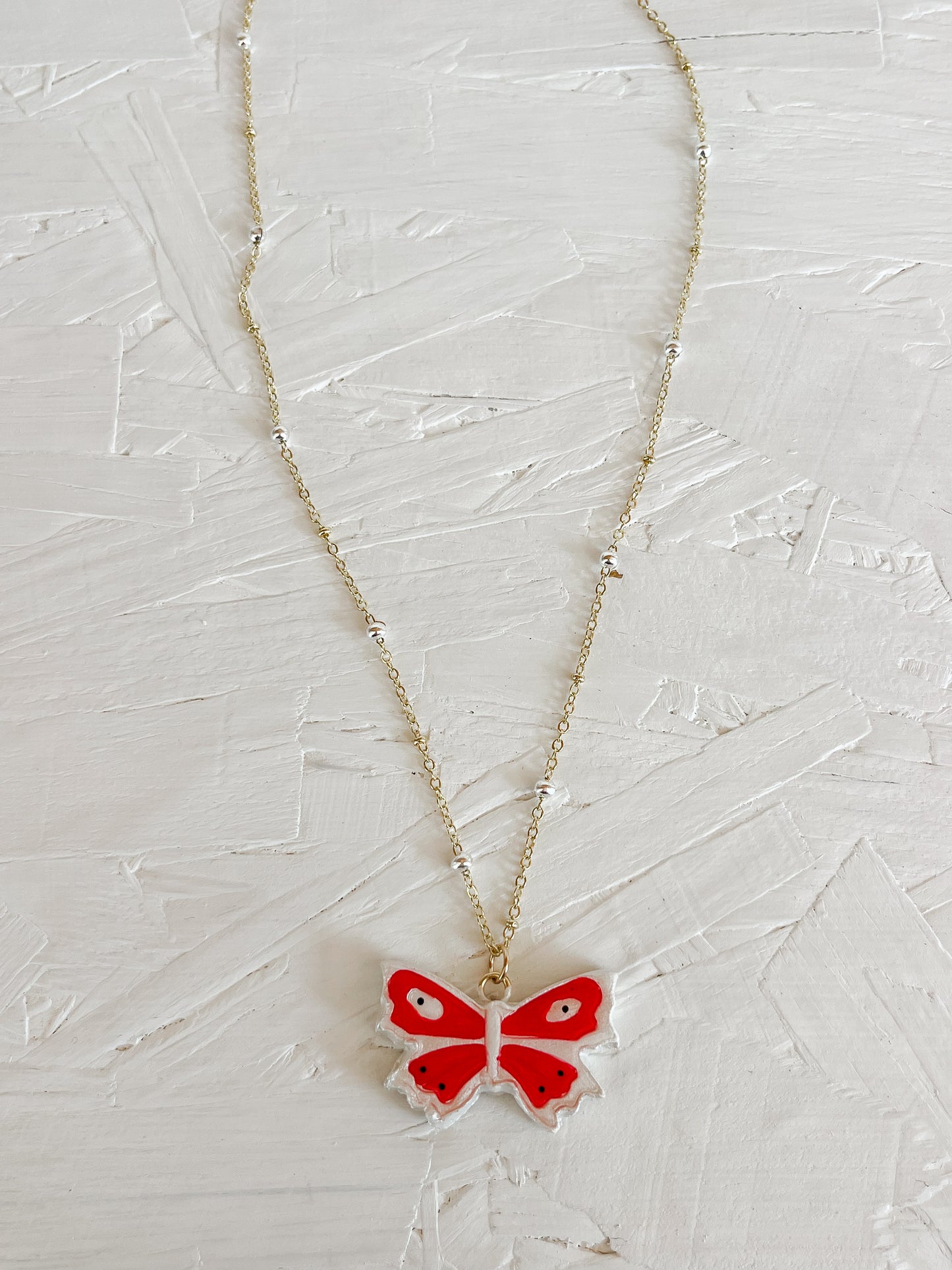 Red butterfly necklace